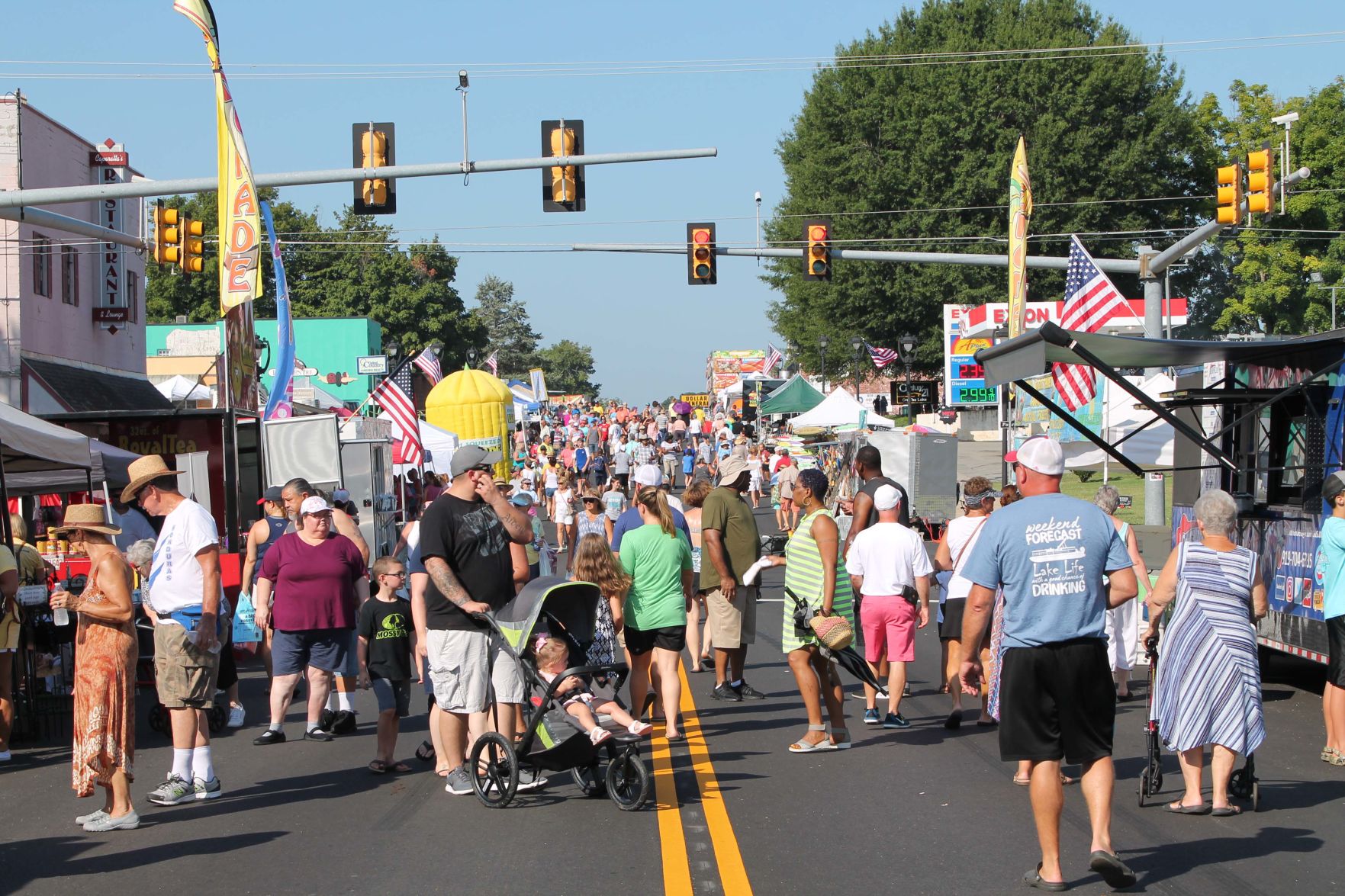 Checking out arts, crafts vendors